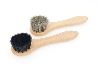 Set of wooden and natural bristle brushes